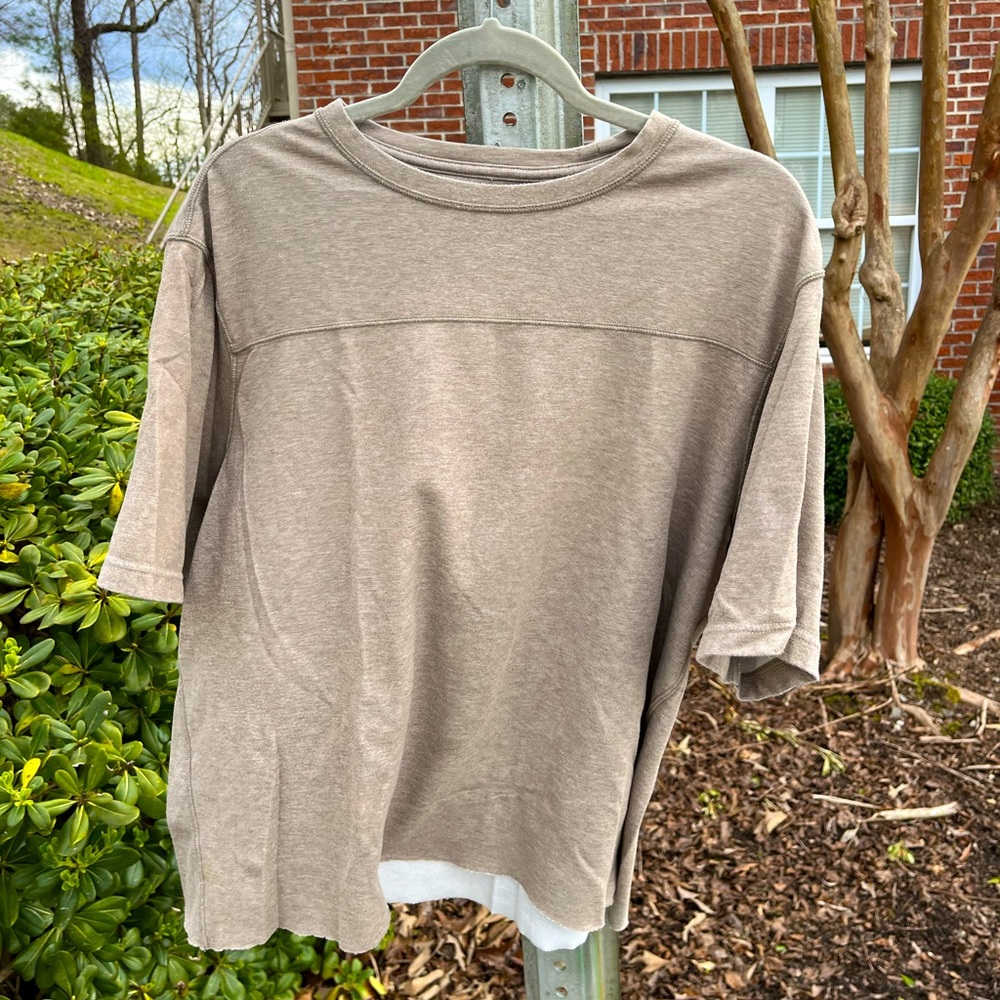 Brown Nike ACG shirt (cropped)